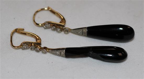 A pair of Edwardian diamond and black onyx drop earrings (one a.f.), drop 1in.